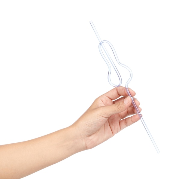 Dłoń trzyma igłę i nitkę